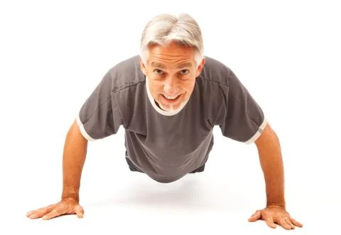 Man In His 50s Doing Pushups 写真素材