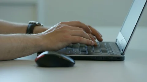 Man on his computer Stock Footage 75444814