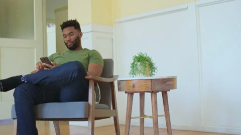 Man on his Smartphone scrolling through menu items on the internet. Stock Footage 209355448