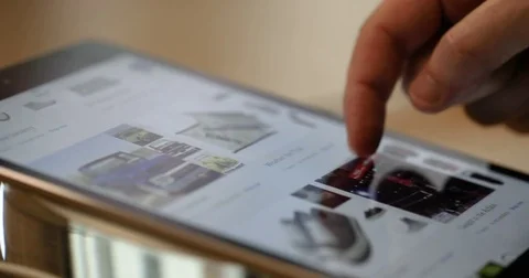 Man on his tablet Video stock 75452264