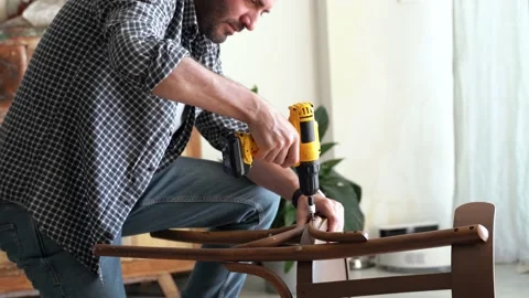 Man in his workshop performs carpentry Stock Footage 199608071