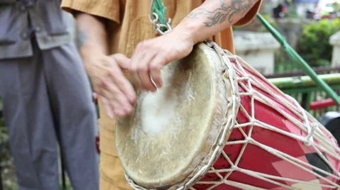 A man hit the ancient drum with Thai northern Native bands. Stock Footage 37579655