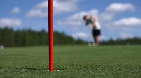 The man hits the Golf ball. Golf course Видео 63775642