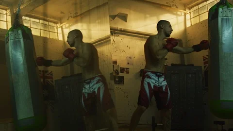 Man hitting a boxing bag Video stock 100034993