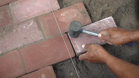 Man Hitting Bricks with Hammer Stock Footage 160036357