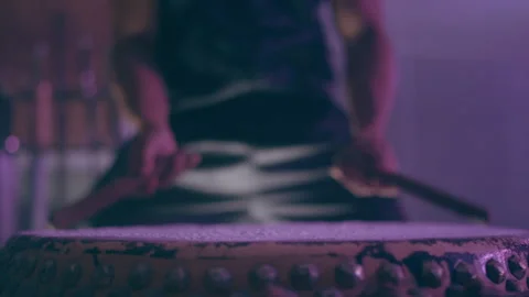 Man hitting a drum with white powder Stock Footage 279827805