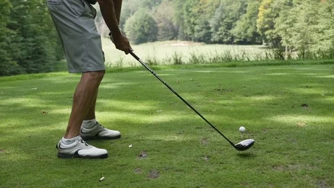 Man hitting golf ball Stock Footage 82319190