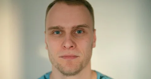 Man is hitting himself with his hand in this face in slow motion Stock Footage 121691840