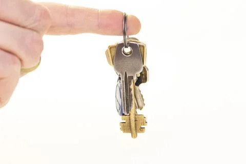 Man hold a Bunch of keys isolated on the white background Stock Photos