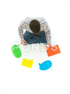 The man hold the dialog signs on the white background. View from above Stock Photos