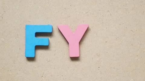 Man hold wood letter to complete english word FYA (Abbreviation of For your a Stock Footage 205075341