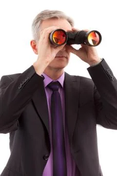 Man holding binoculars Stock Photos