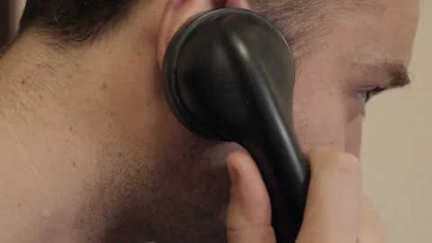 Man Holding Black Handset Talking Landline Telephone Stock Footage 237024689