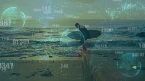 Man holding board walking shore, testing surf, stepping into waves for surf as Stock Footage 333426119