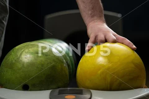 Man holding a bowling ball Stock Photos