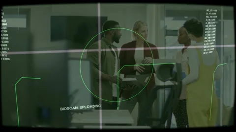 Man holding box initiating BIOSCAN upload while tech team checking console, HUD Stock Footage 333287334