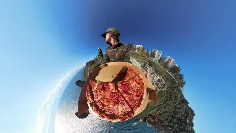 Man Holding a Box of Pizza with a Tiny Planet Effect, Creating a Unique Stock Footage 304284436