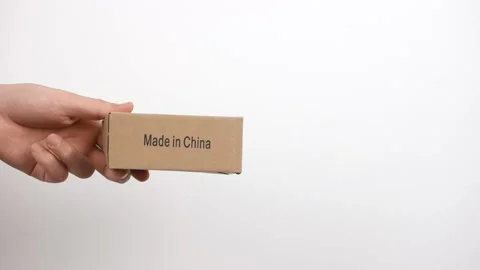 Man holding a box on a white background. Stockbeeldmateriaal 150331947