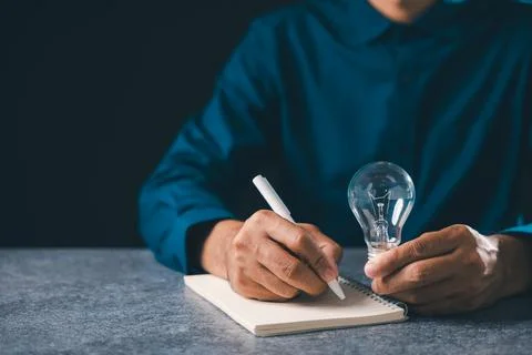 Man holding bulb for mindset light idea concept creative innovation busines.. Stock-Fotos