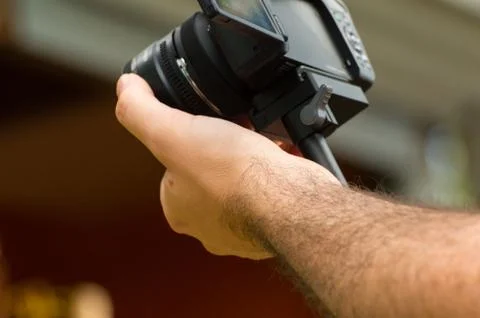 Man Holding Camera Stock Photos
