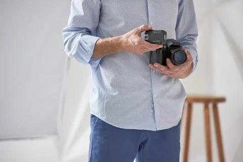 Man holding camera Stock Photos