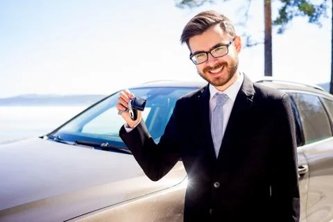 Man holding car keys Stock Photos