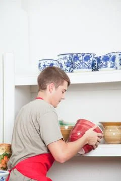 Man holding a ceramic 写真素材