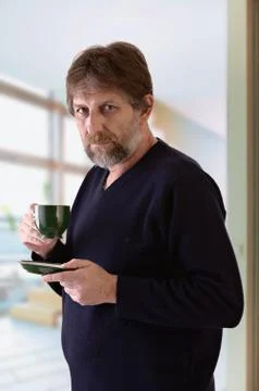 Man holding a cup Foto stock