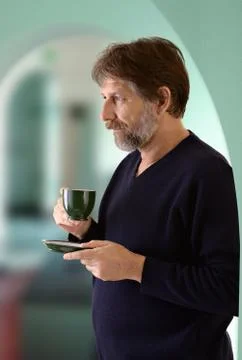 Man holding a cup Stock Photos