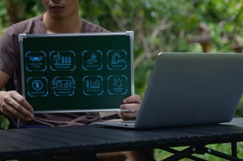 Man Holding Digital Graphic Elements About Sustainable Farming Practices Stock Photos