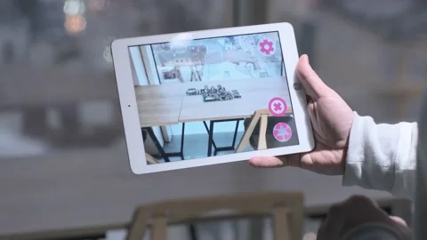 Man Holding Digital Tablet with Augmented Reality  Software Chooses 3D buildings Video stock 146086994