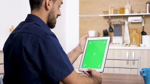 Man holding a digital tablet PC in vertical mode Stock Footage 97284061