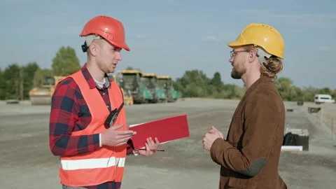 Man holding documentation, director controlling work process Stock Footage 274408636