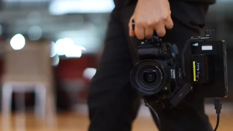 A man holding DSLR camera Video stock 273210540
