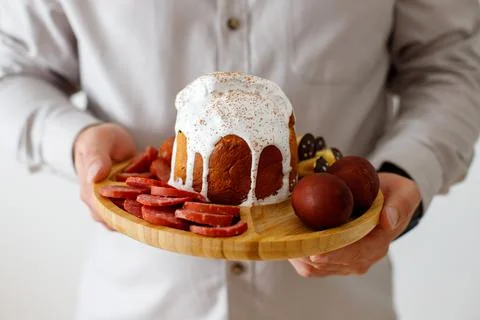 Man holding easter bread, kulich, easter cake Stock-Fotos
