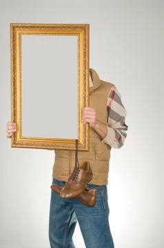 Man holding empty frame Stockfoto's