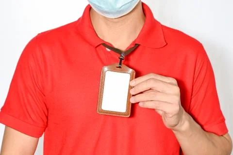 Man holding empty Identification ,white blank employee id card mockup Stock Photos