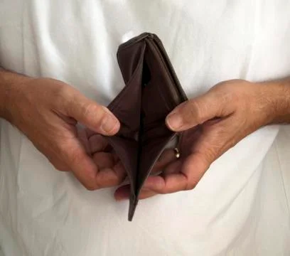 Man holding empty wallet Stock Photos