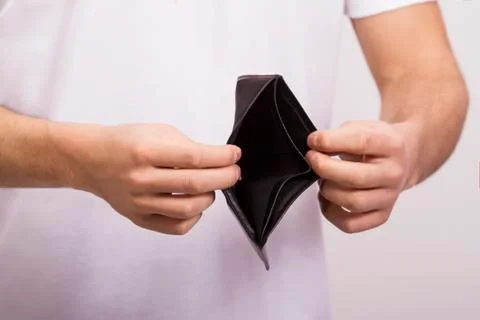Man holding an empty wallet Stock Photos