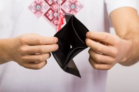 Man holding an empty wallet Stock Photos