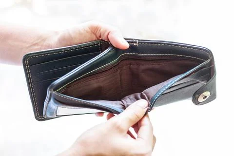 Man holding an empty wallet Stock Photos