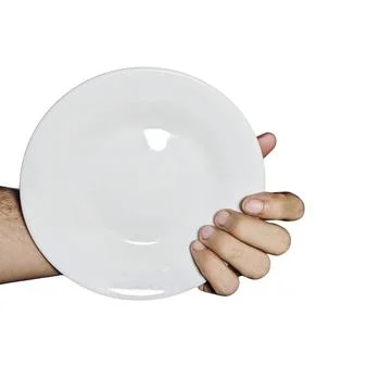 Man Holding Empty White Ceramic Plate 스톡 사진