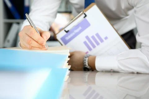 Man holding folder with bar chart Stock Photos
