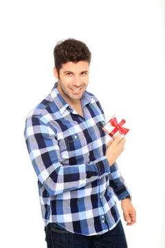 Man holding a gift Stock Photos