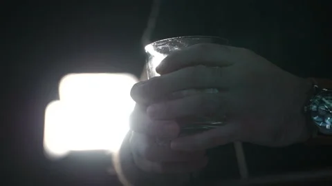 Man is holding the glass Video stock 86252006