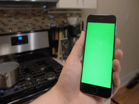 Man holding green screen iPhone Stock Footage 80324029