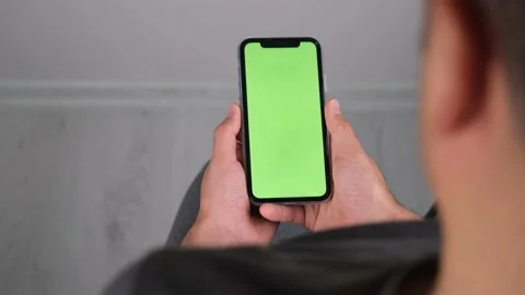 Man holding green screen phone Video stock 236378175