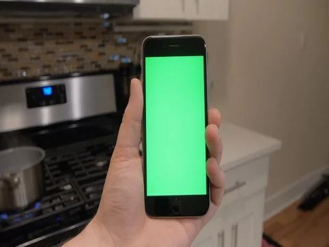 Man holding green screen smart phone Video stock 80324042