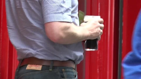 Man Holding Guinness 스톡 동영상 79426581