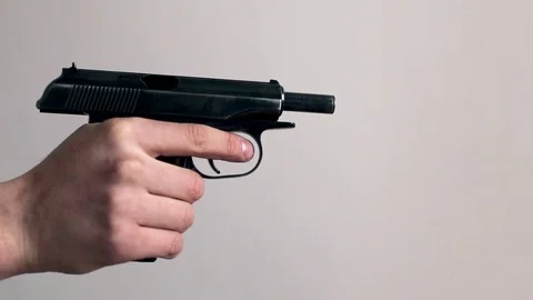 Man holding gun weapon Stock Footage 74415841